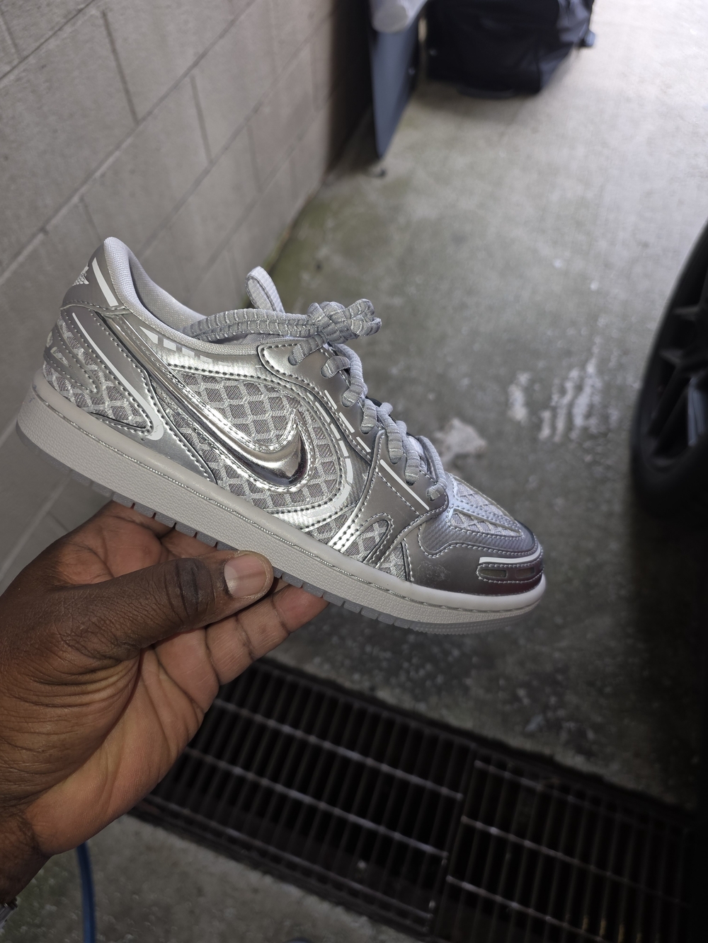 Nike Women’s Metallic Silver Low-Top Sneakers